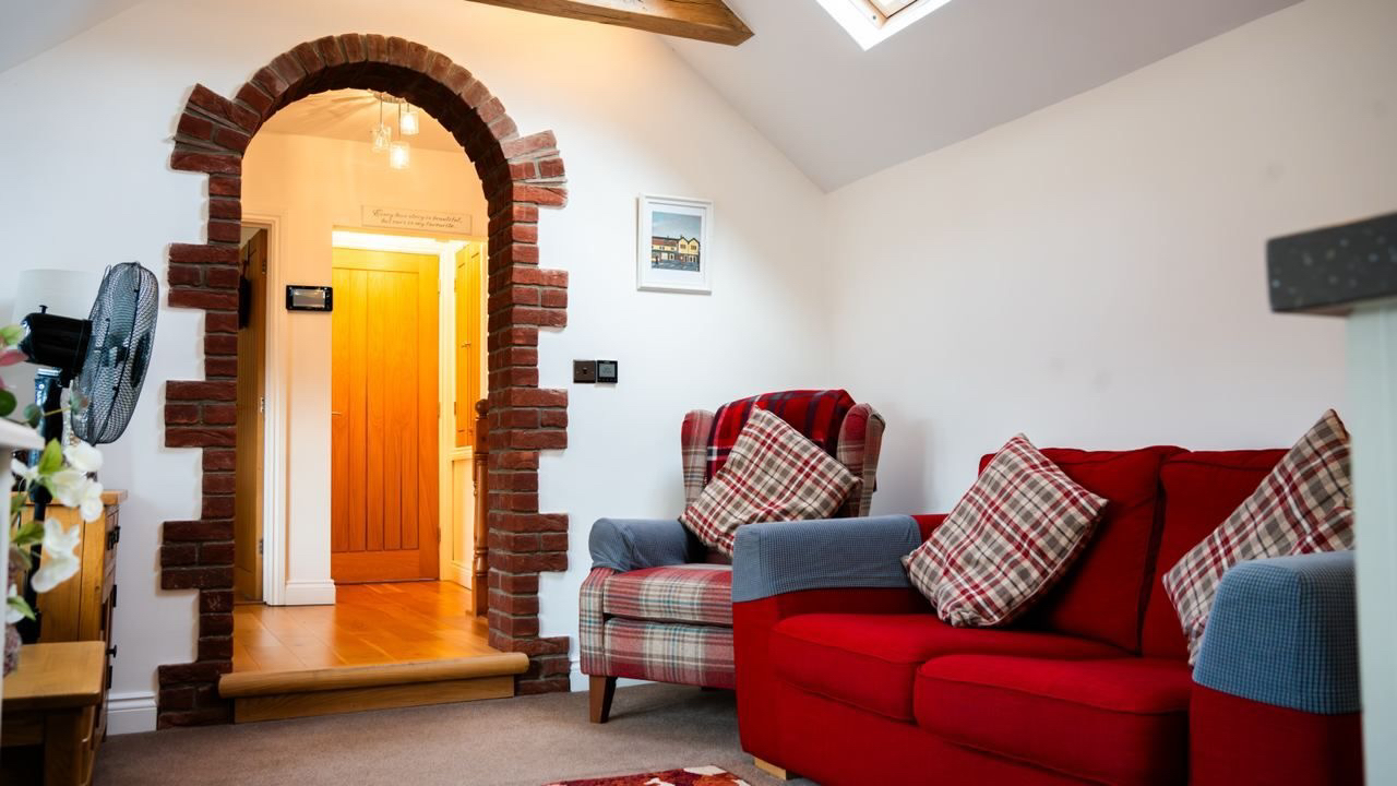 Cosy lounge with comfortable seating and cushions